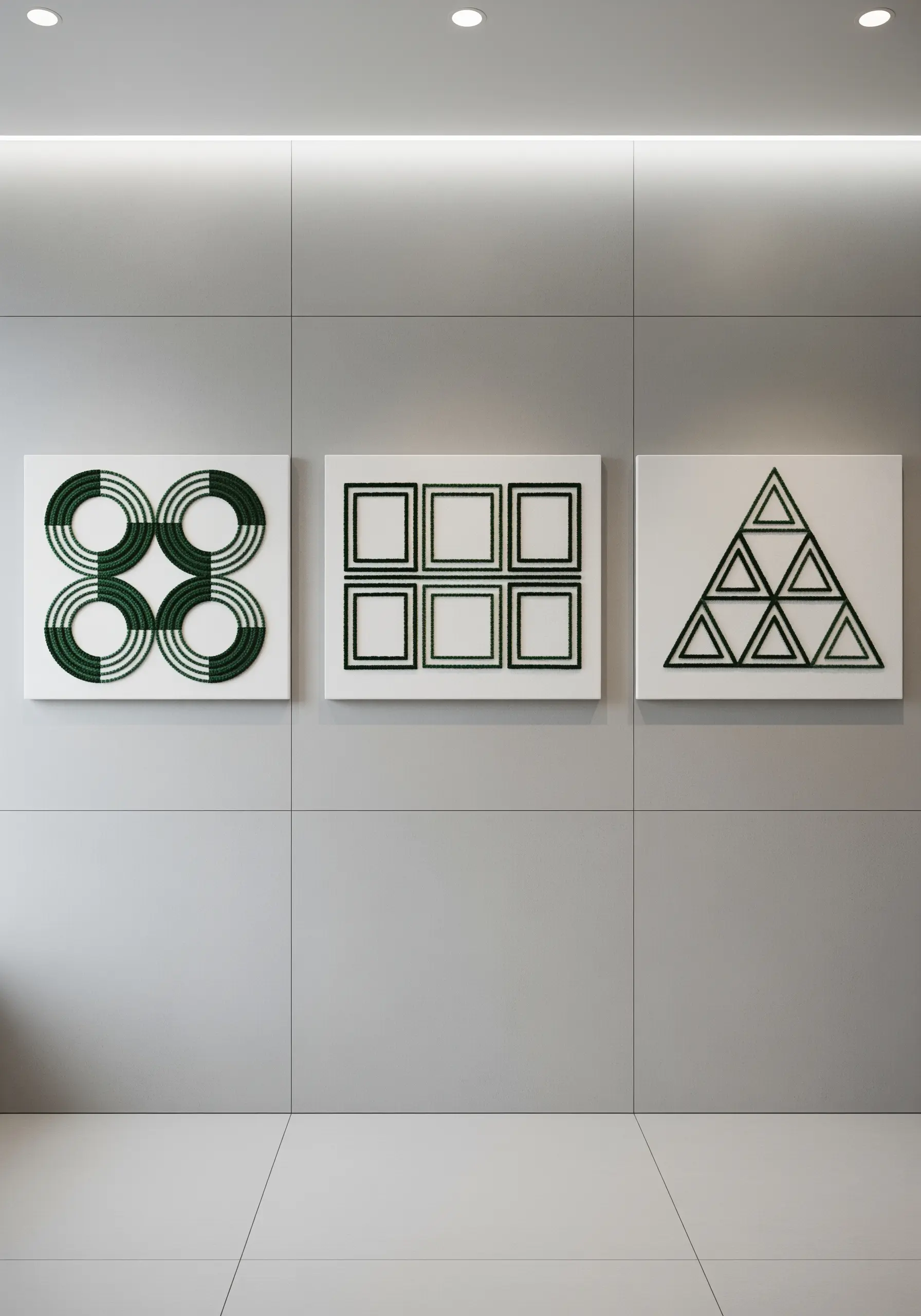 Three white canvases with minimalist geometric shapes filled with dense green stitching.