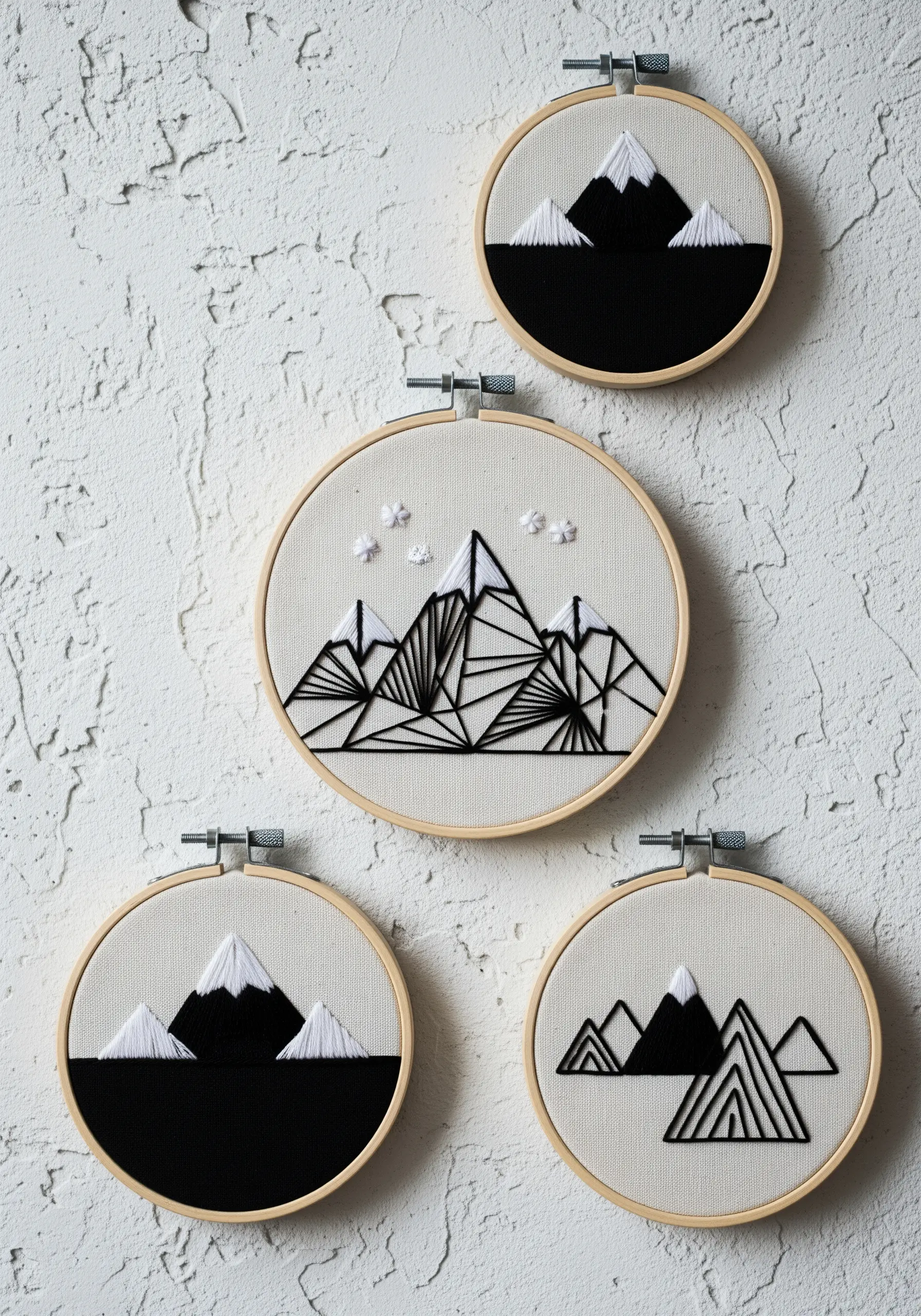 Geometric mountain range embroidery using black and white straight stitches