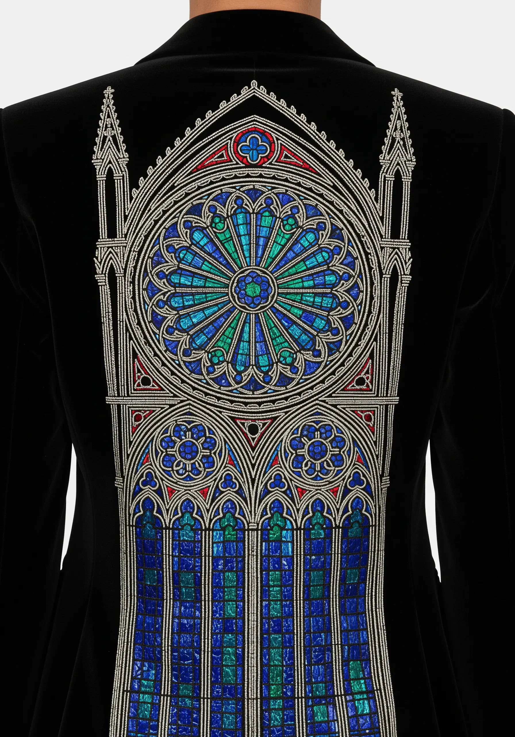 Intricate stained glass cathedral window embroidered on the back of a black velvet blazer.