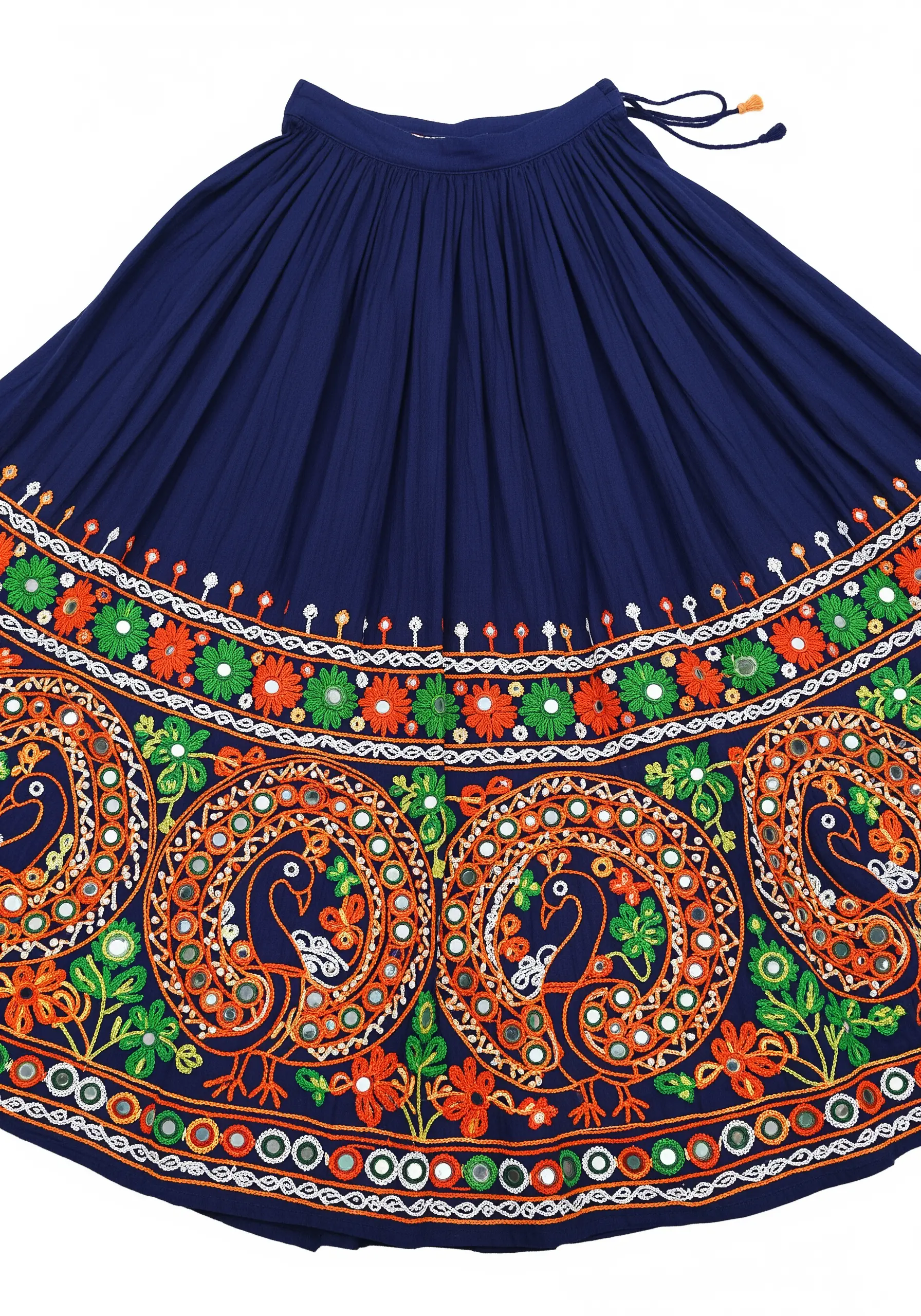 Colorful Indian embroidery on a navy blue skirt, featuring peacock motifs and shisha mirror work.