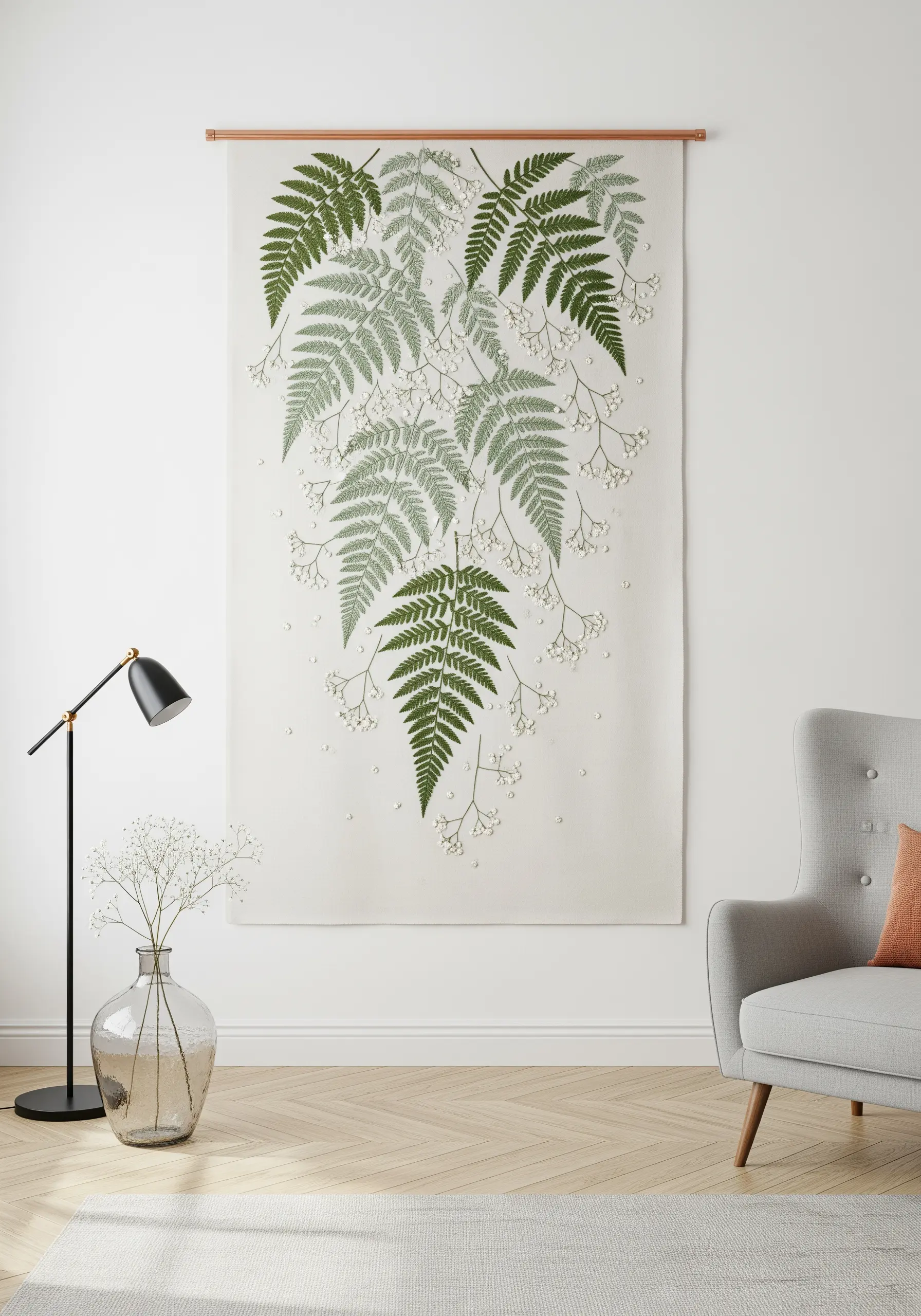 A large wall hanging featuring embroidered cascading ferns and tiny white flowers.