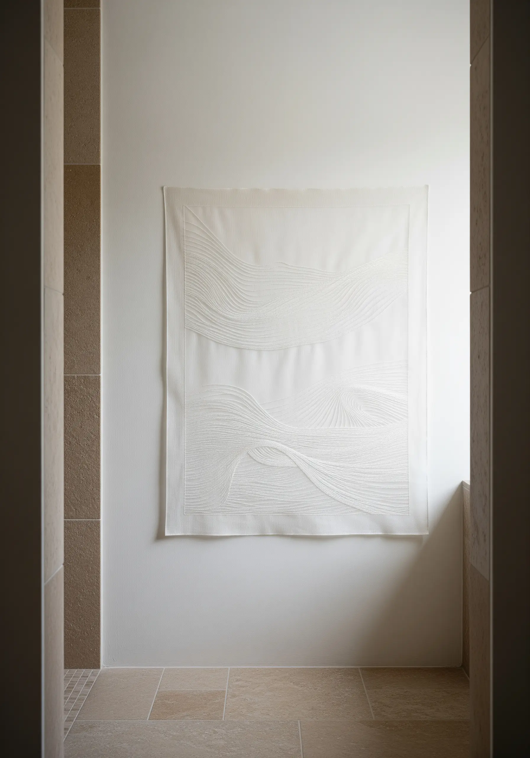 Subtle white-on-white embroidery with delicate, abstract lines on a sheer fabric panel.