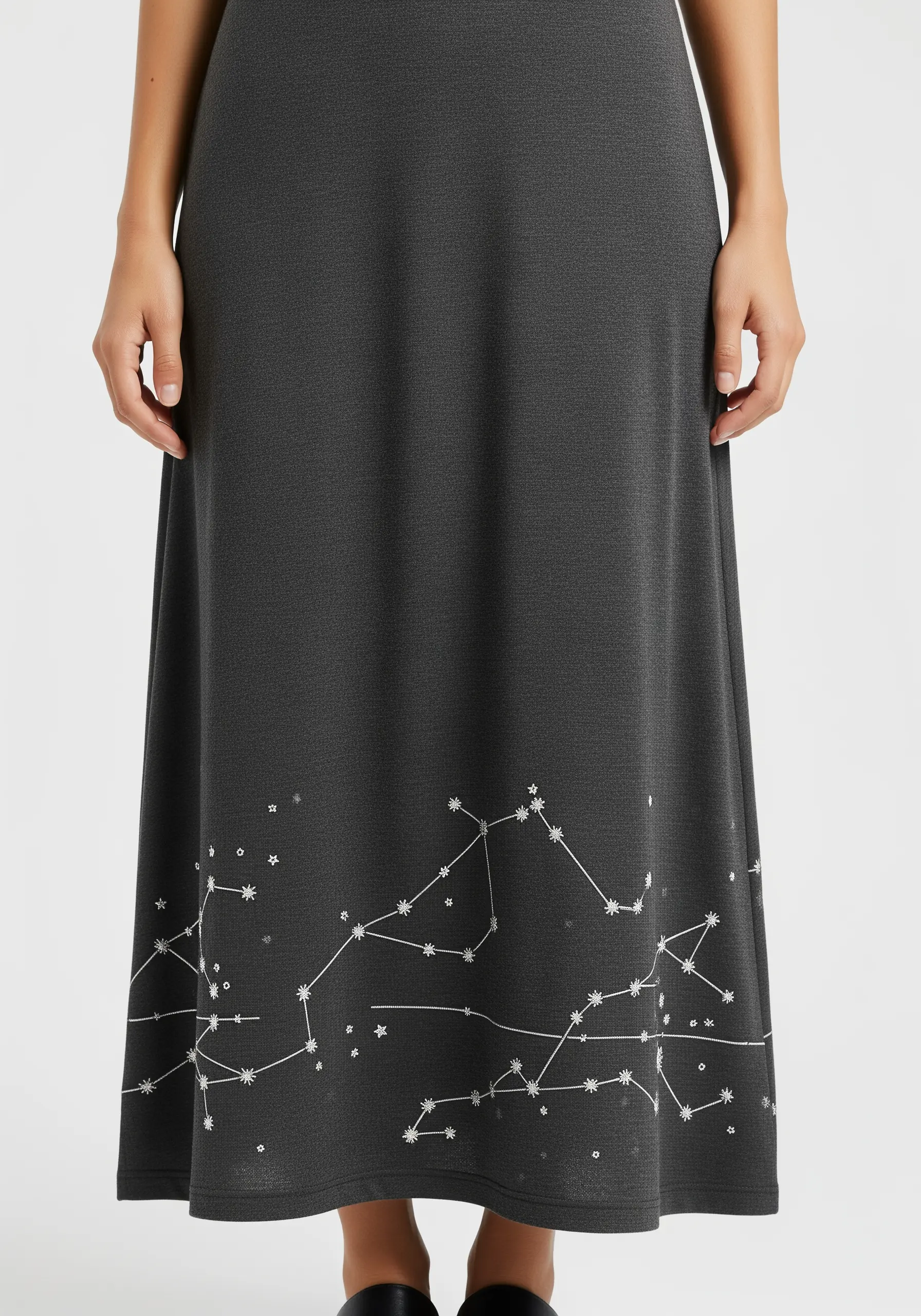 Grey dress with white embroidered constellation lines and star knots