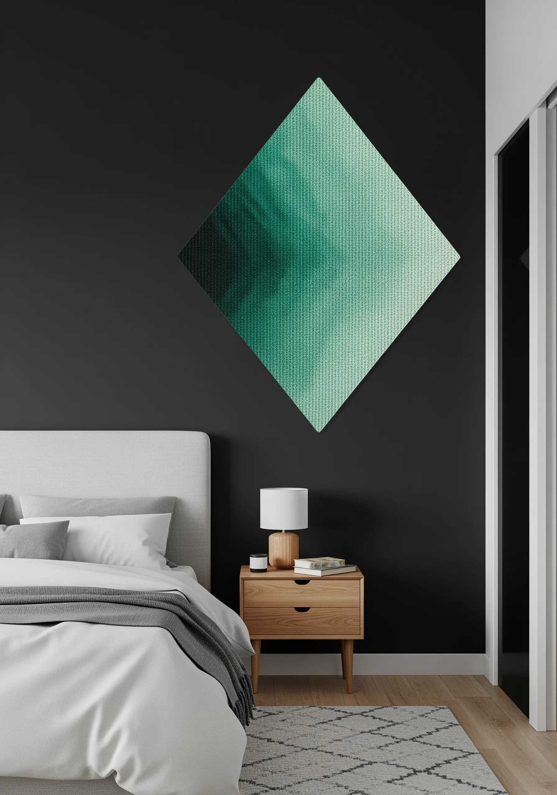 Large diamond-shaped wall art featuring a green gradient texture on a black wall