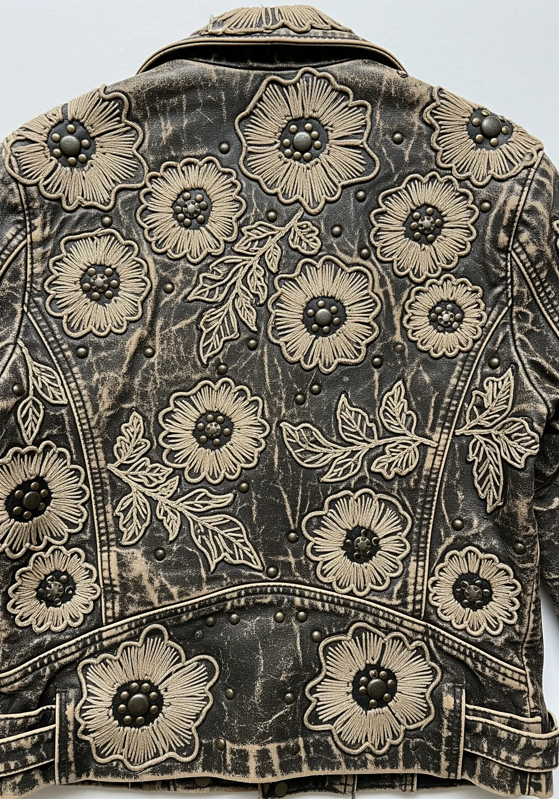 Leather jacket with raised beige floral embroidery details