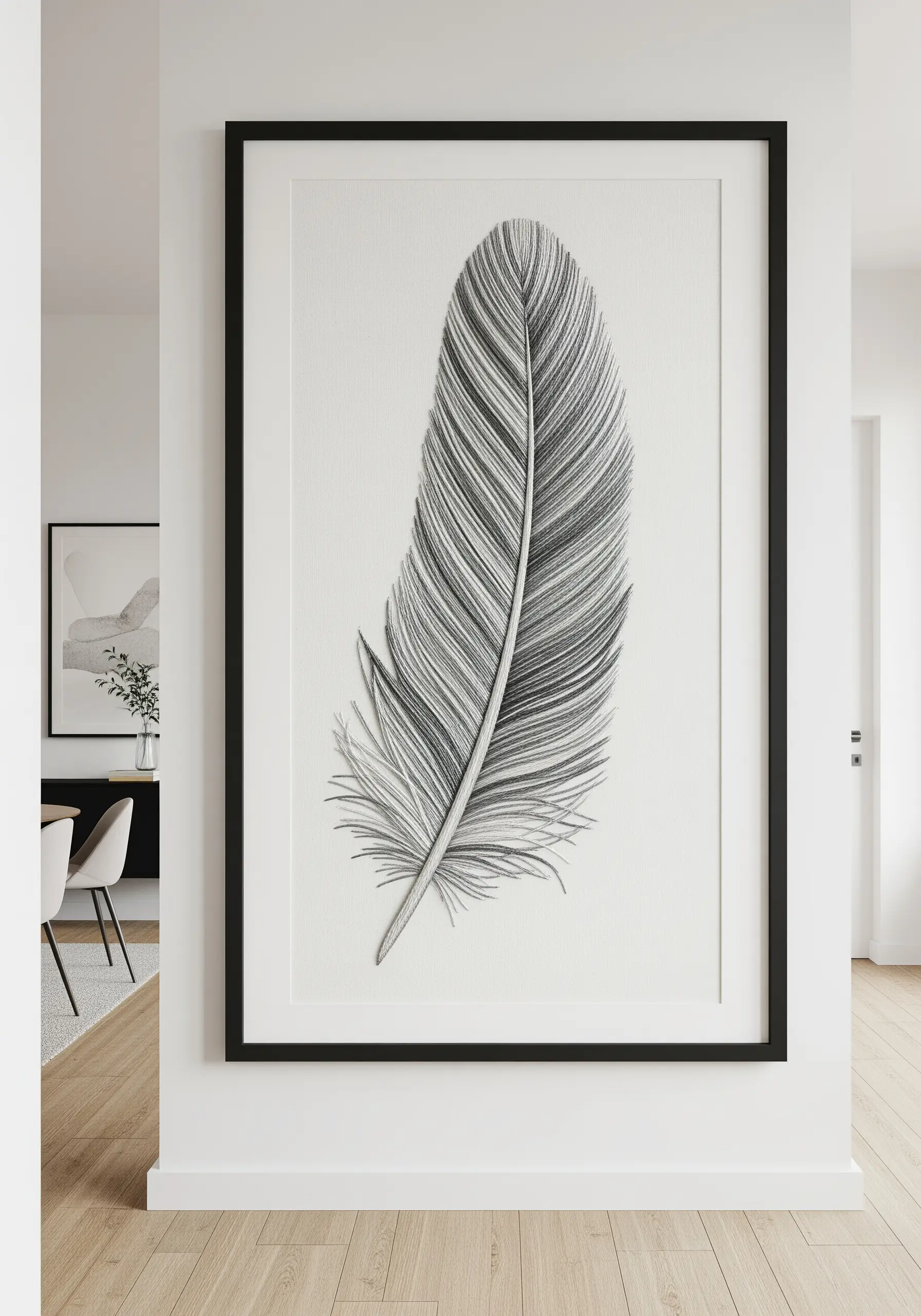 A large, framed, hyper-realistic embroidery of a grey and white feather created with thread painting.