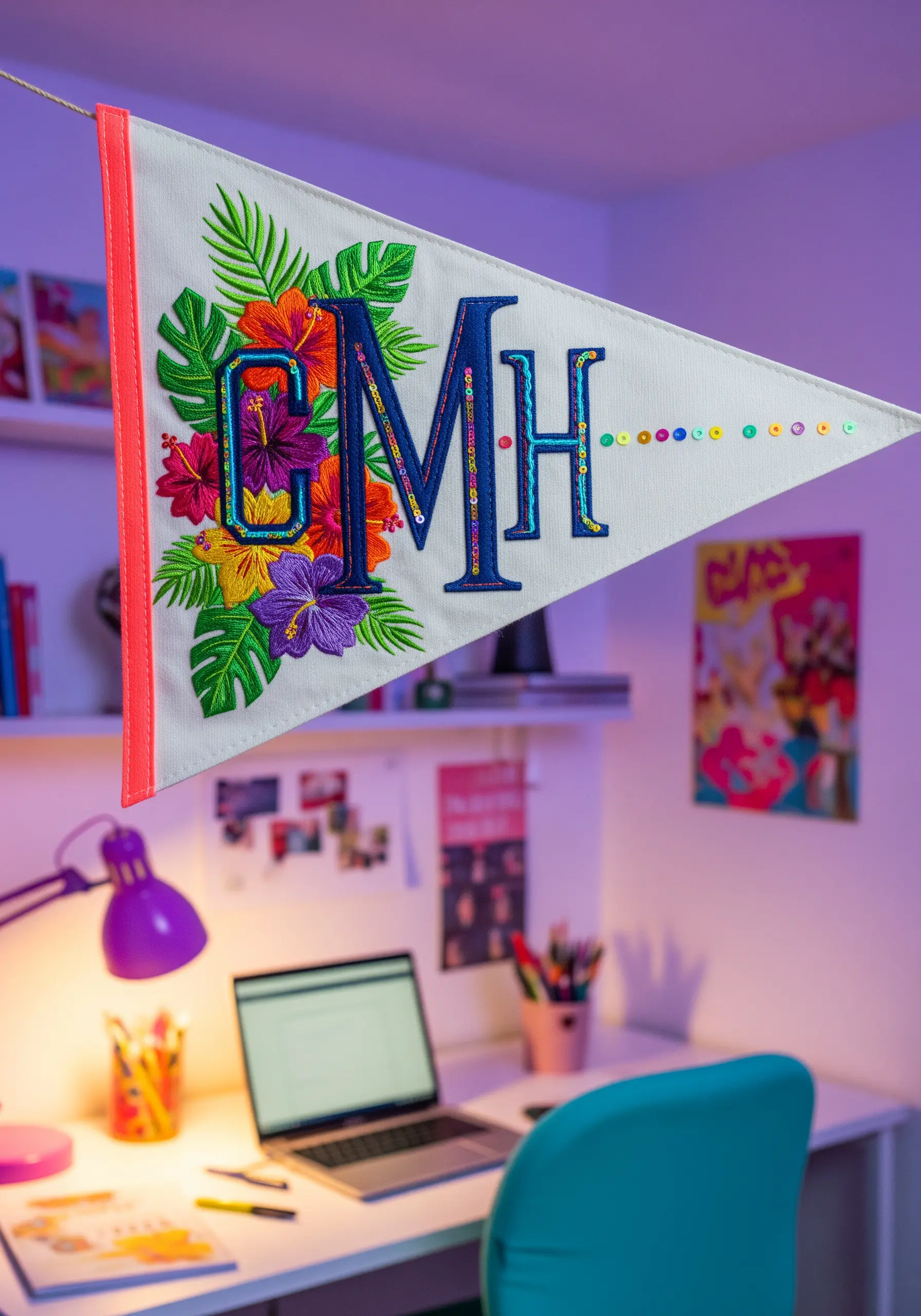 Embroidered pennant flag with tropical flowers and 'CMH' monogram