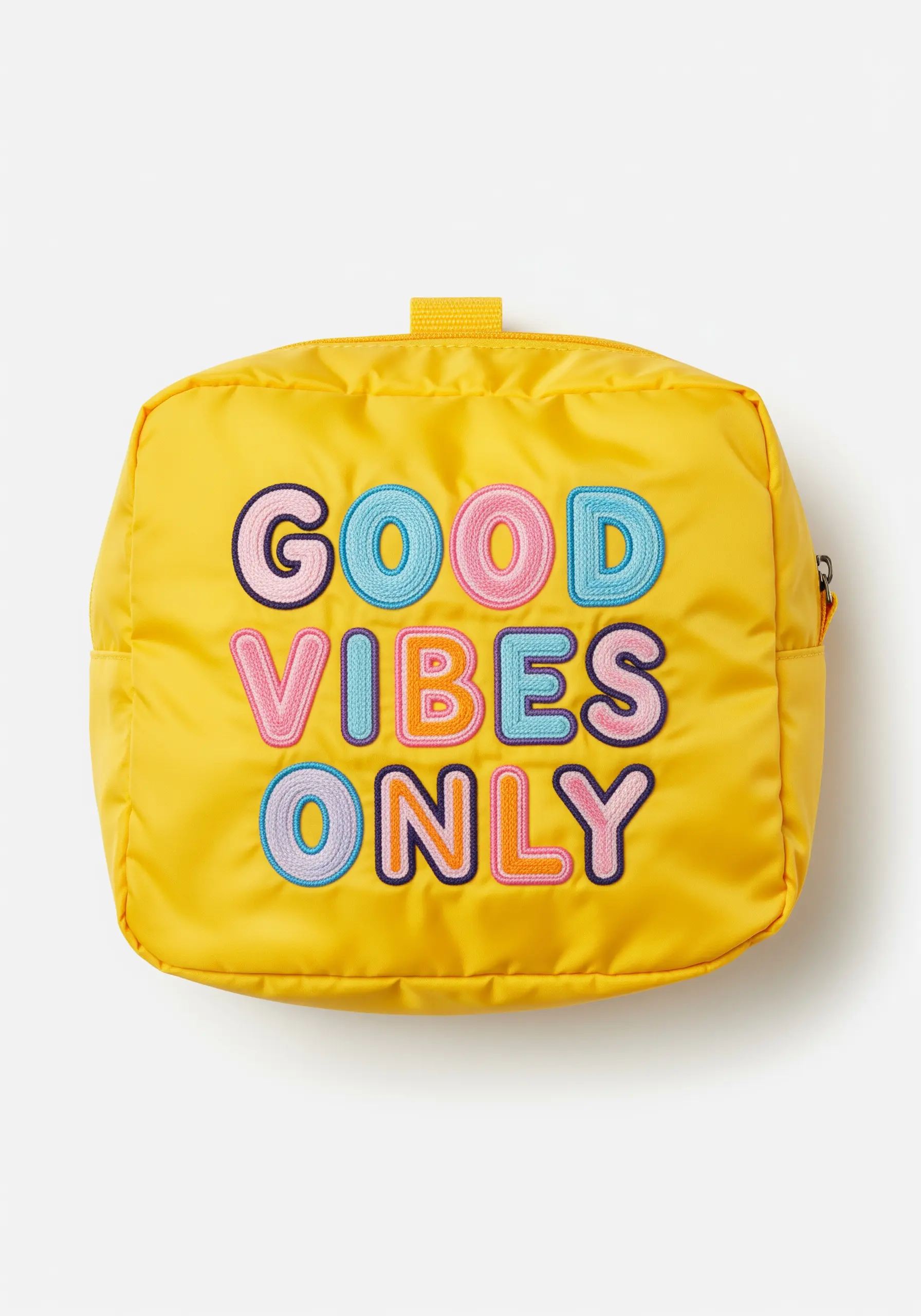 “GOOD VIBES ONLY” in colorful, puffy appliqué letters on a bright yellow pouch.