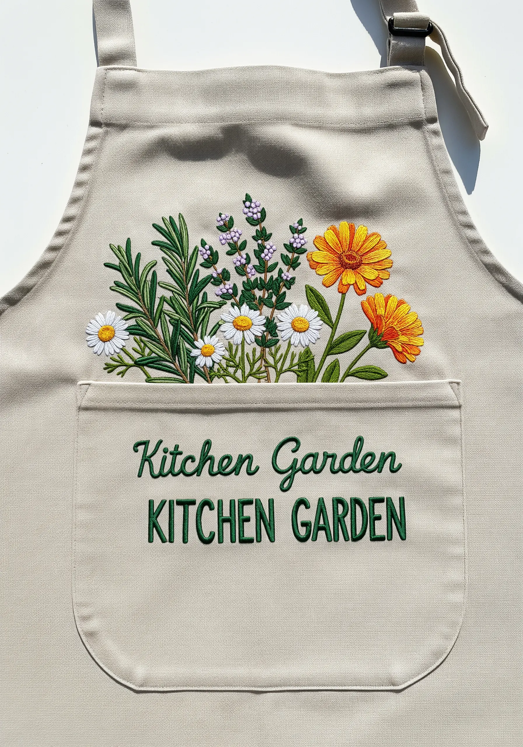 A kitchen apron with a bouquet of embroidered herbs like rosemary and chamomile.