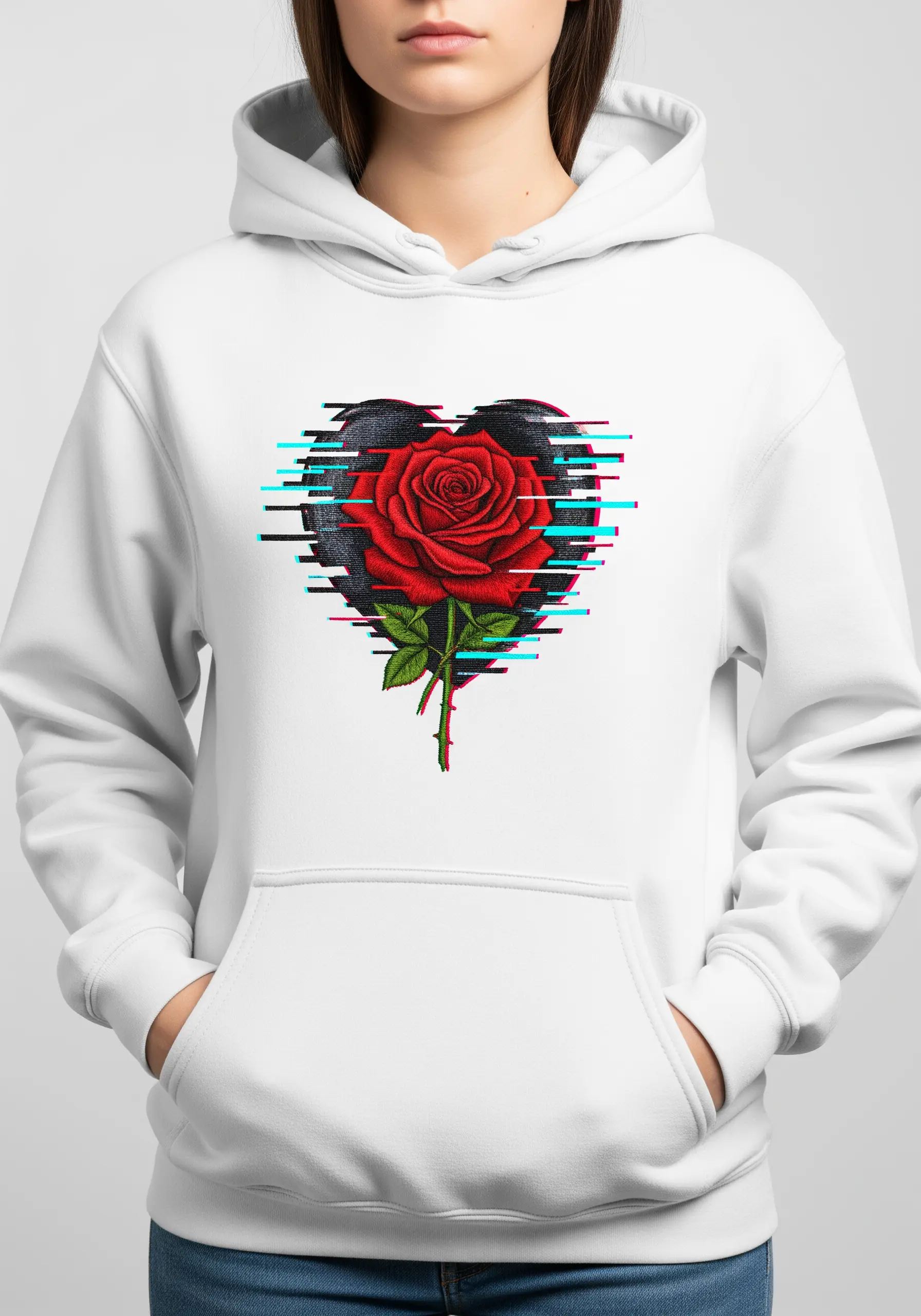 A red rose inside a black heart with a digital glitch effect embroidered on a white hoodie.