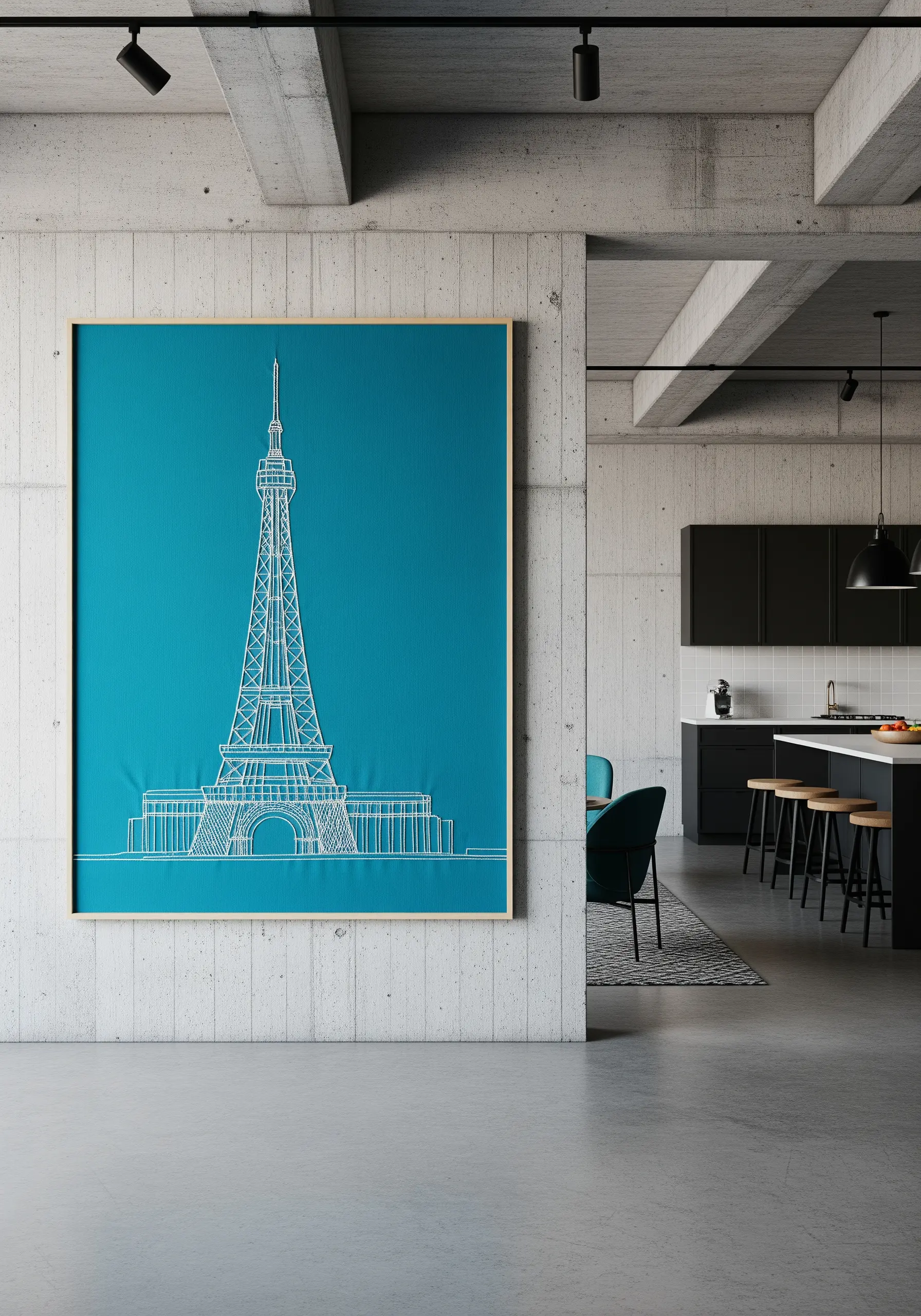 A large, framed line-art embroidery of the Eiffel Tower in white thread on teal fabric.