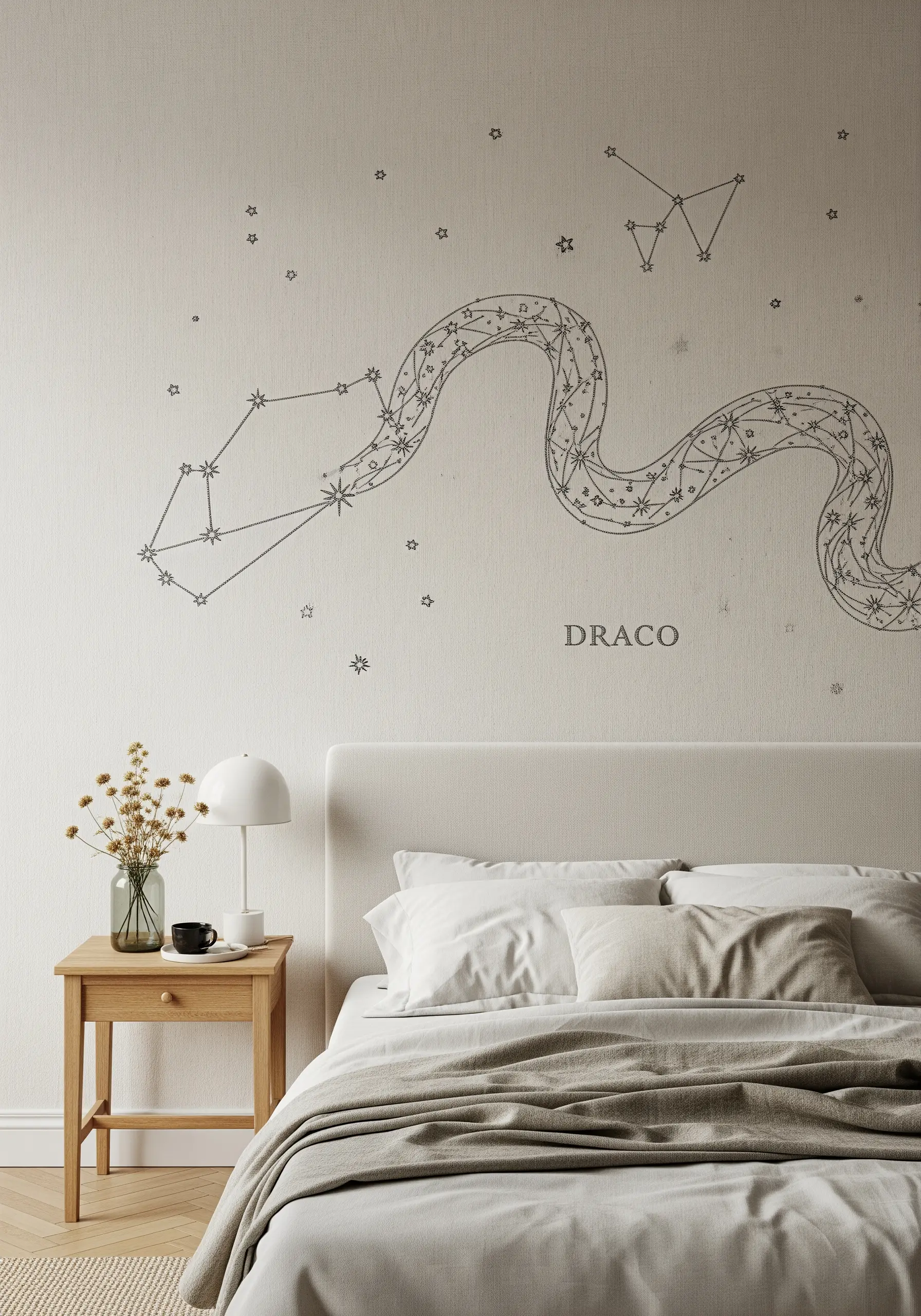 A wall-sized embroidery of the Draco constellation above a headboard.