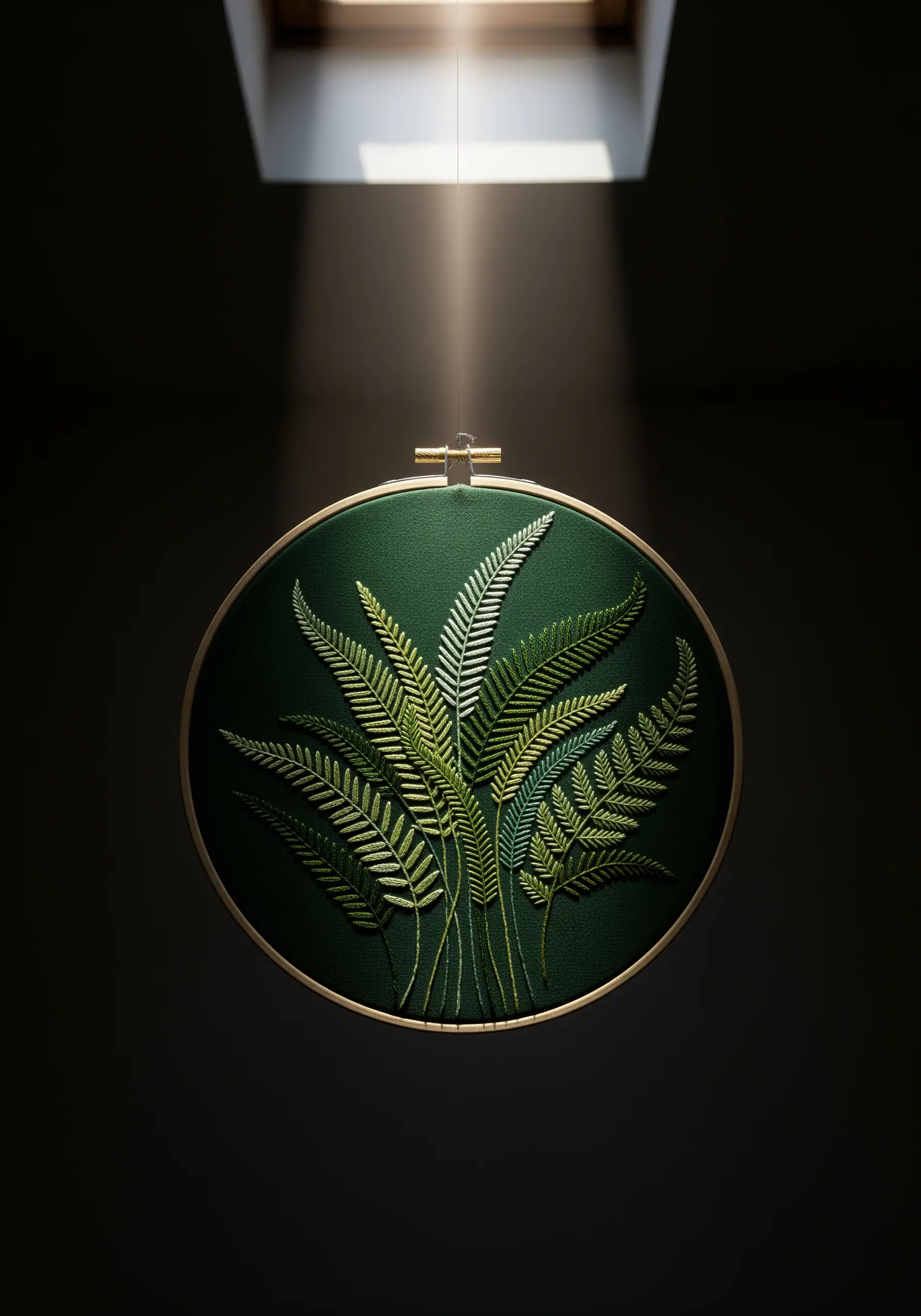 A cluster of ferns embroidered in various shades of green on a dark background.