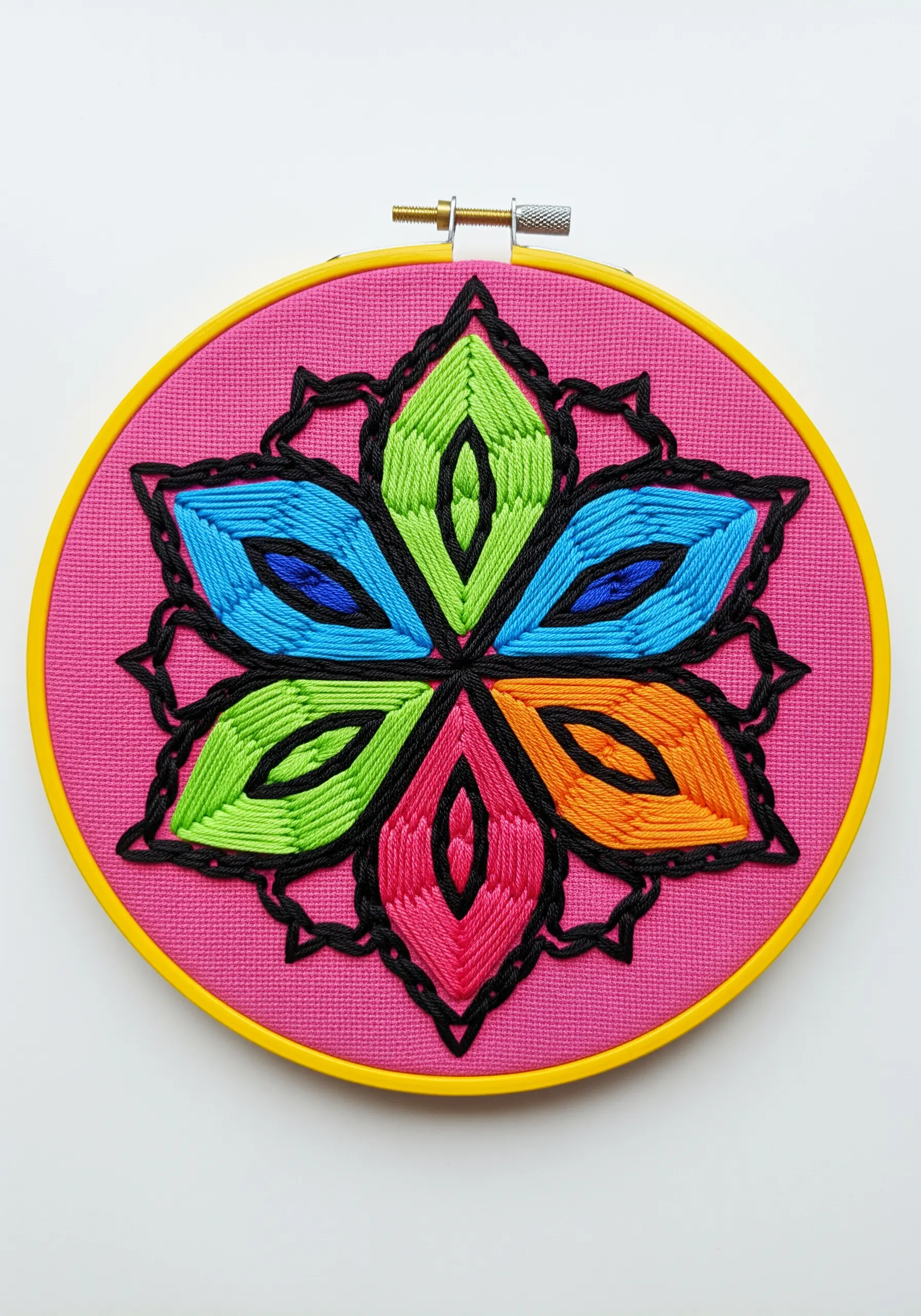 A colorful six-petaled flower mandala with bold black outlines on a bright pink background.