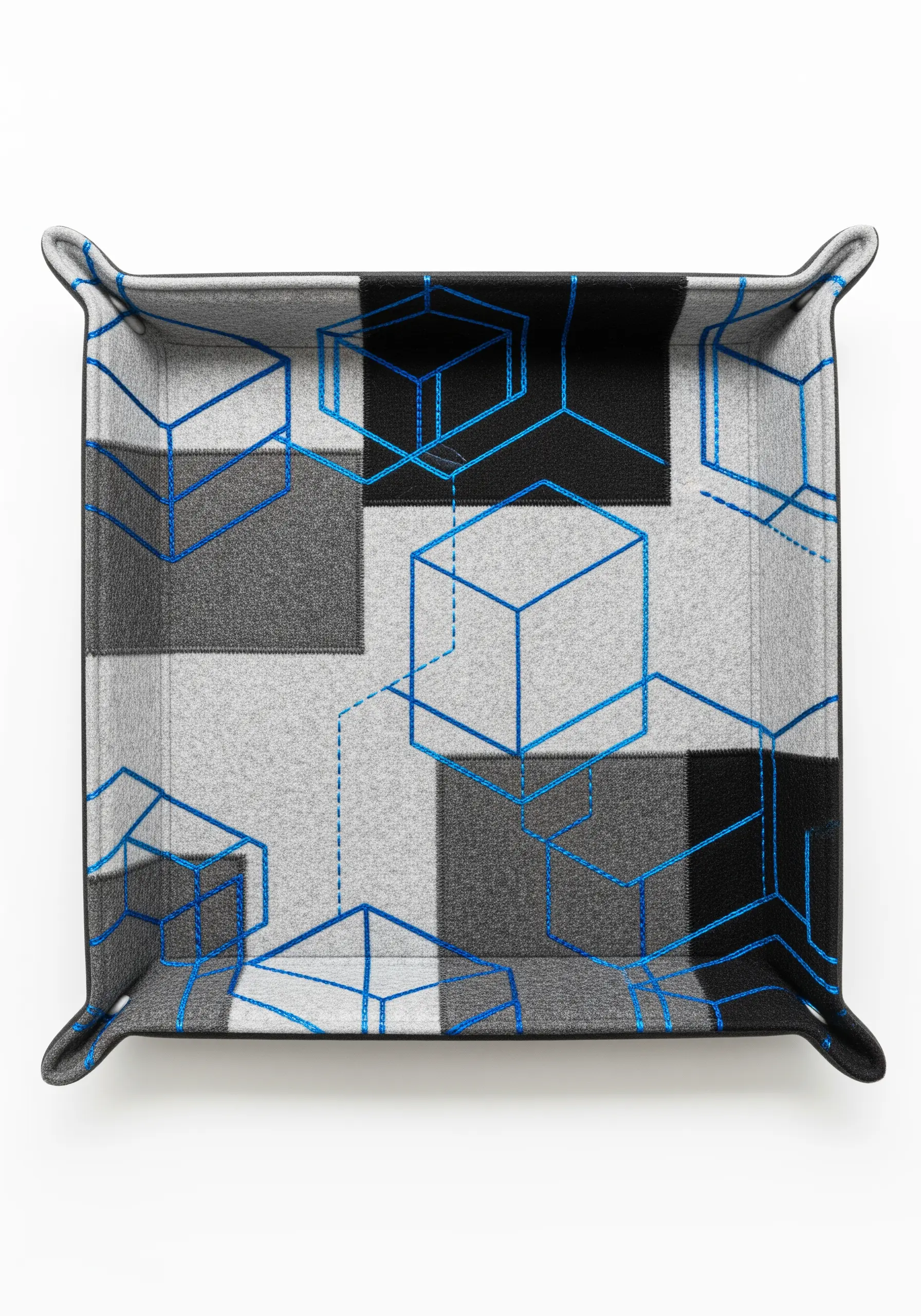 Felt valet tray with a checkerboard pattern and bright blue embroidered cube outlines.