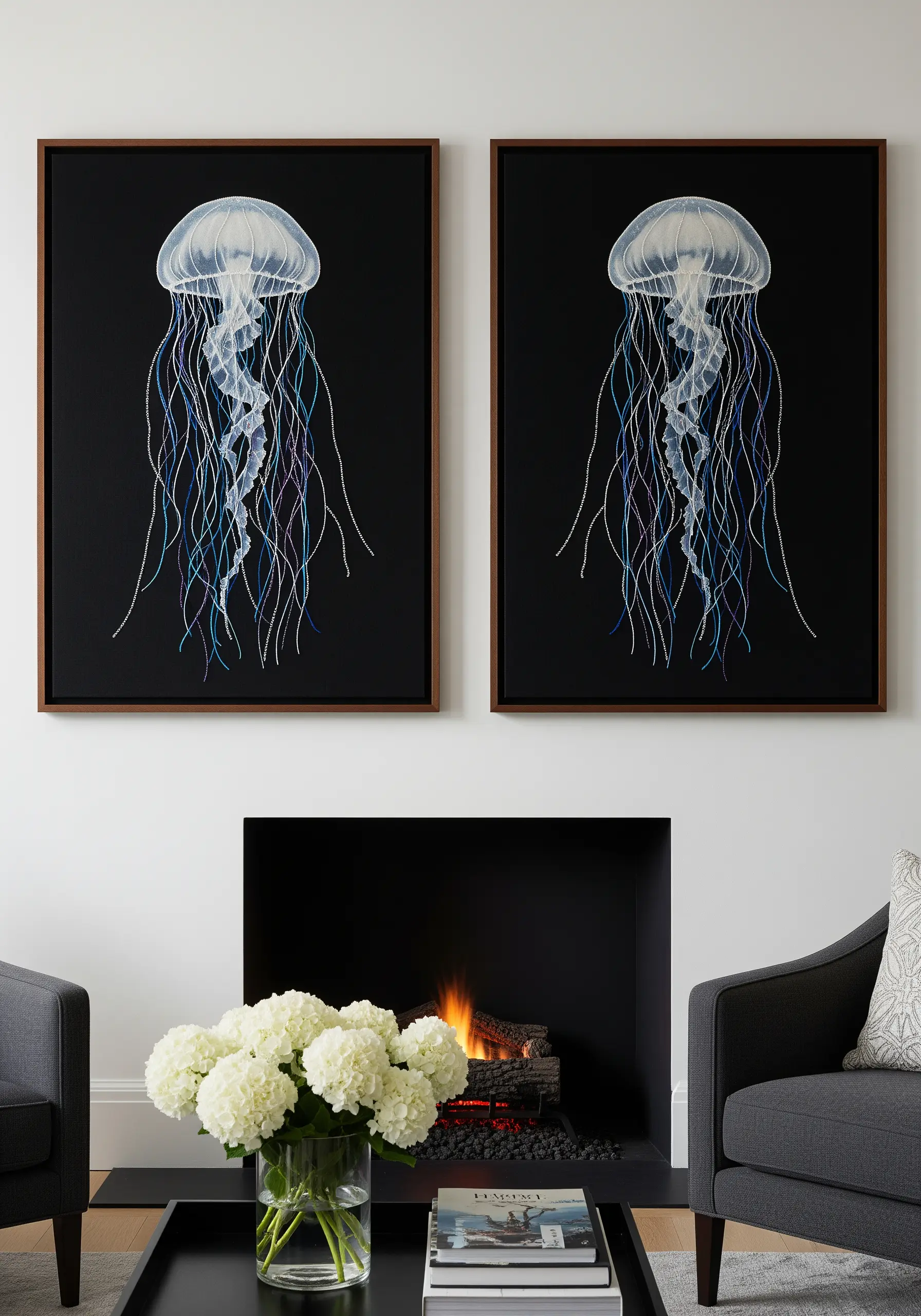 Two embroidered jellyfish with iridescent threads on a black background.