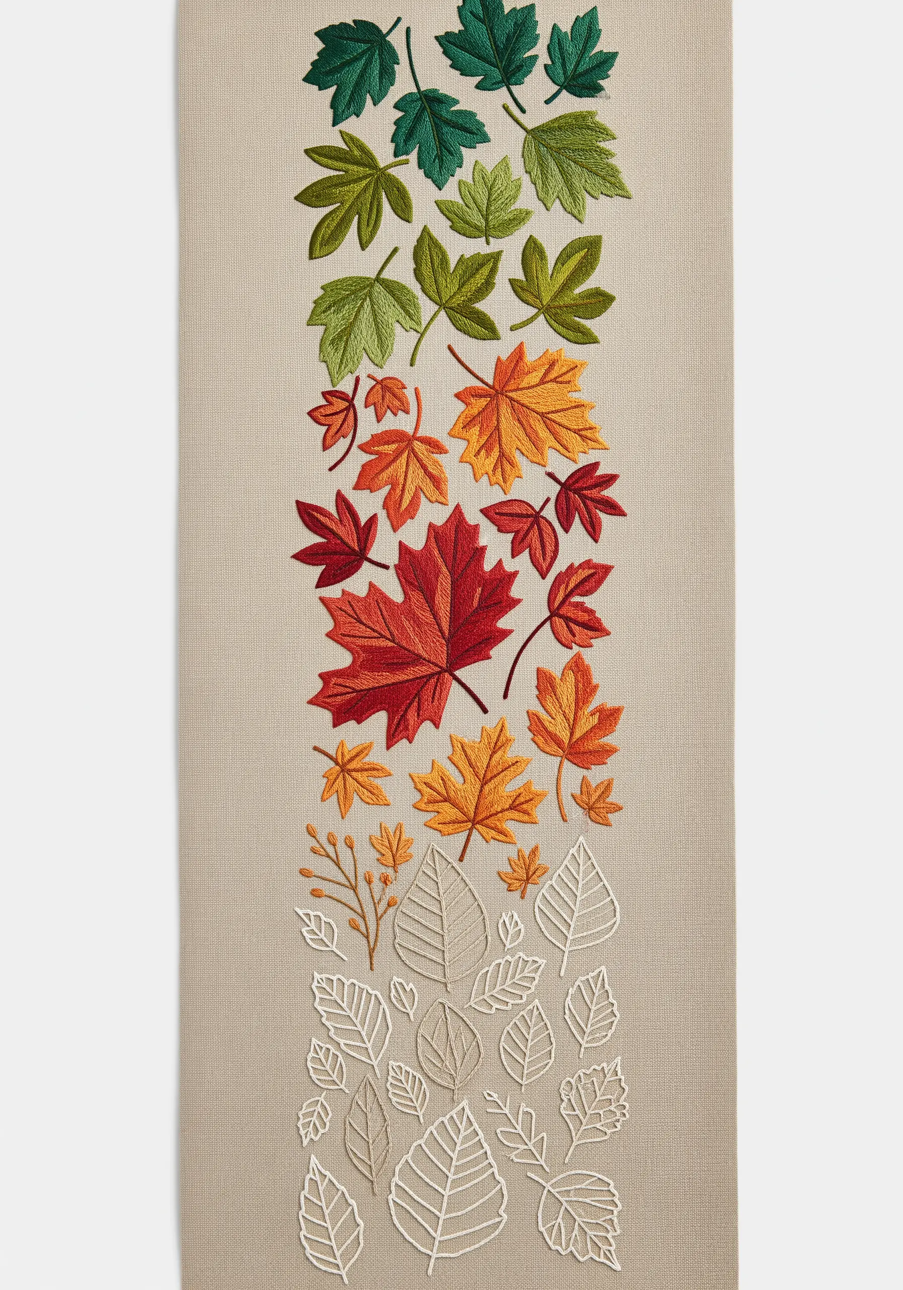 Table runner showing a gradient of leaves from full green to autumn colors to bare white outlines.