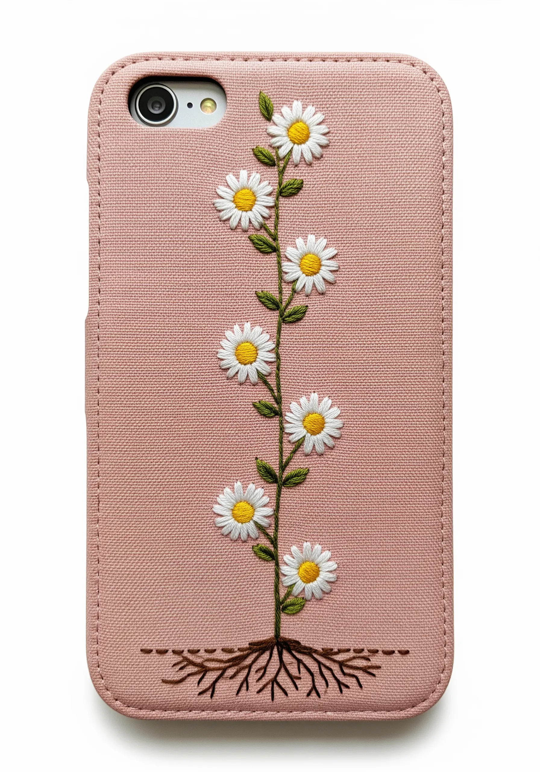 A single daisy stem embroidered on a pink phone case with delicate roots spreading at the bottom.