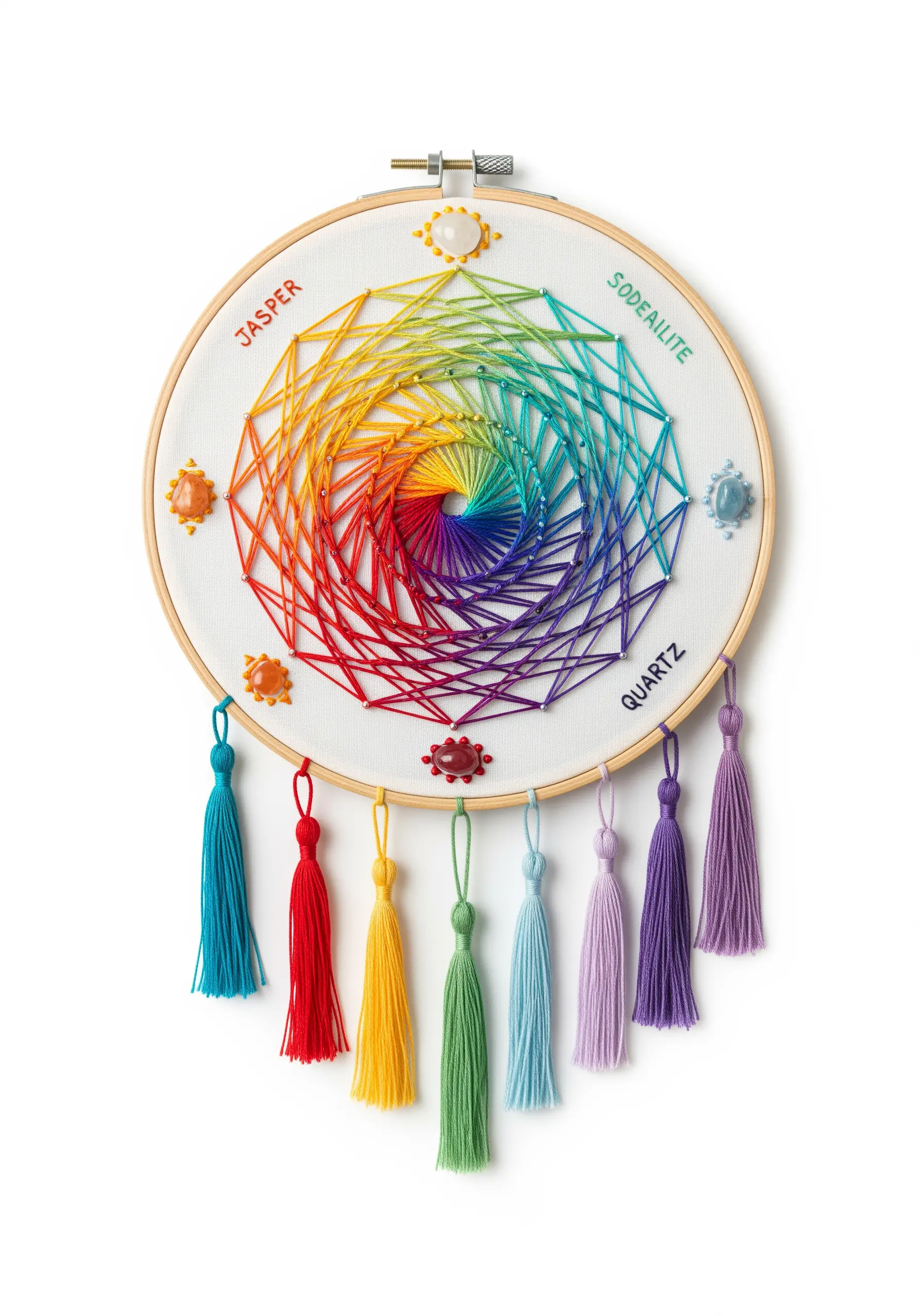 Rainbow spiral string art with chakra-colored tassels and corresponding gemstones.