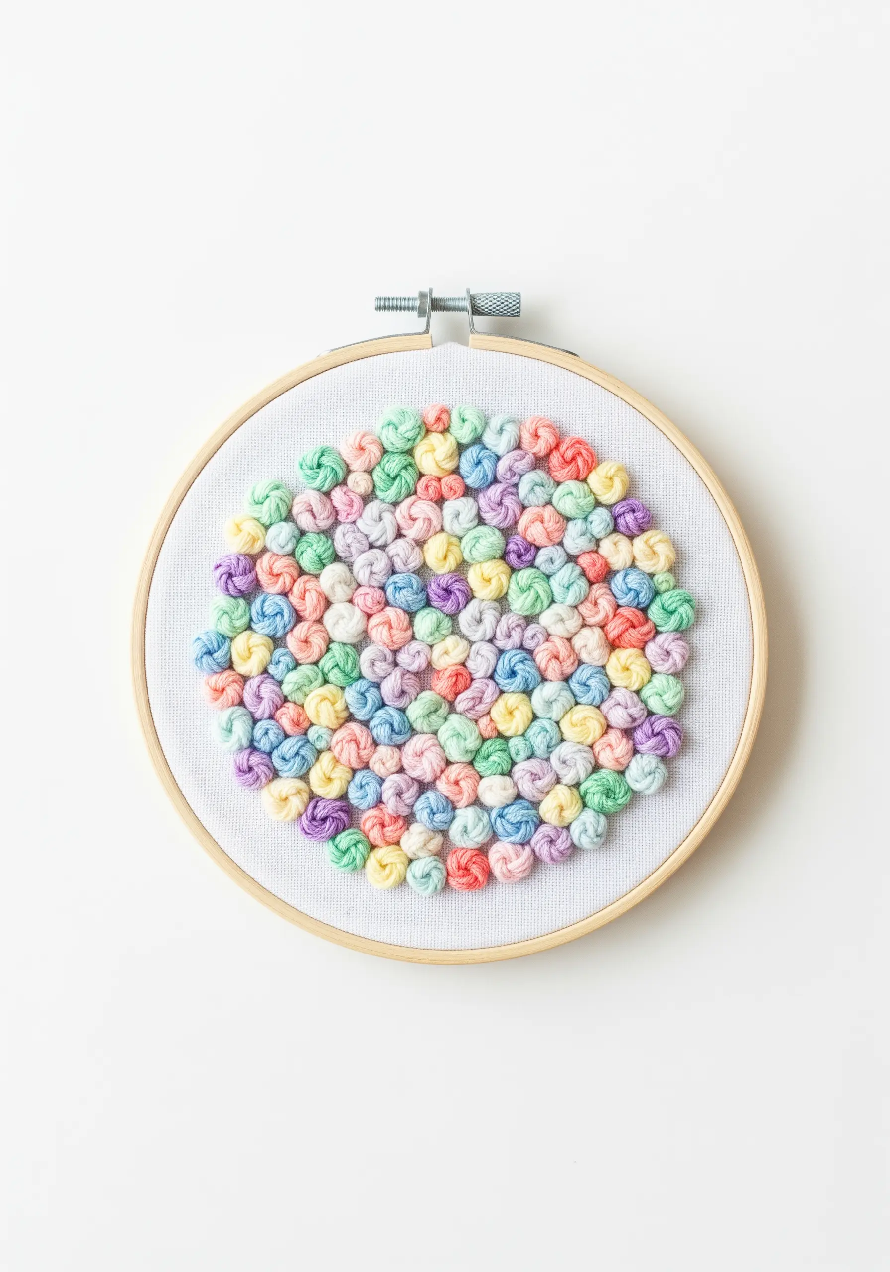 Circle filled entirely with multi-colored pastel French knots