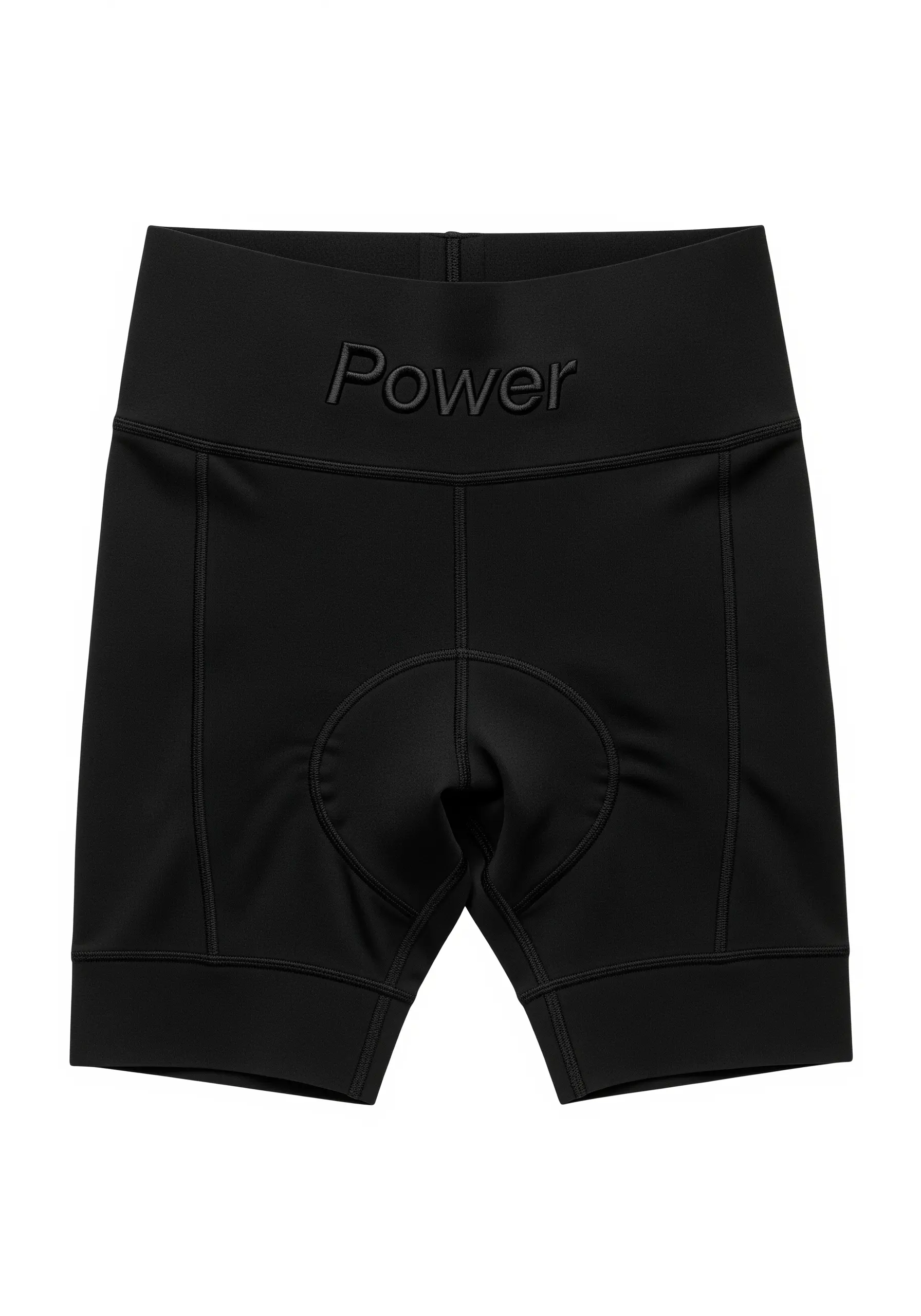The word “Power” in raised, 3D black embroidery on black cycling shorts.
