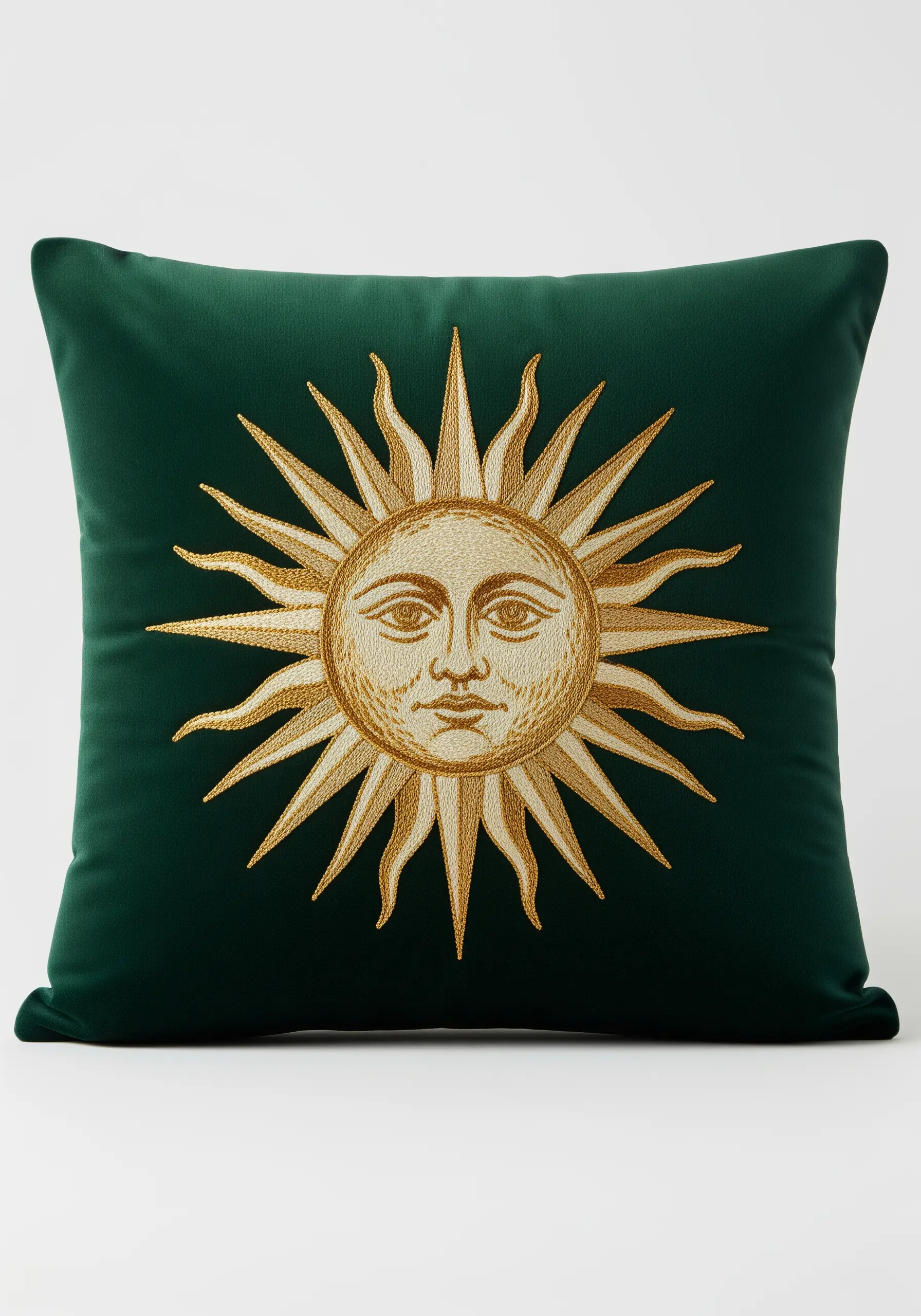 A gold embroidered sun with a face, in the style of Louis XIV, on green velvet.