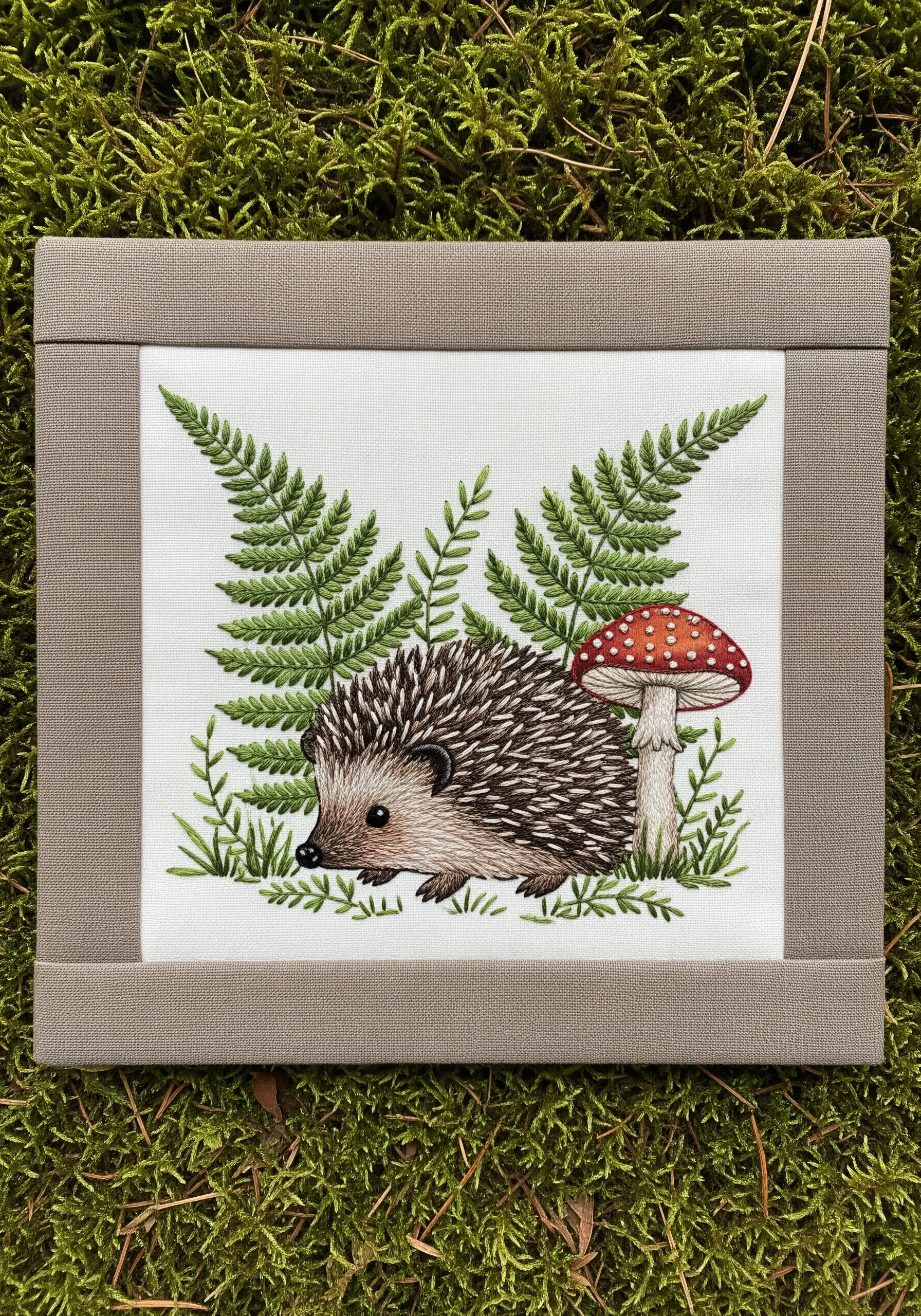 Hedgehog embroidery with directional straight stitches for its sharp quills.