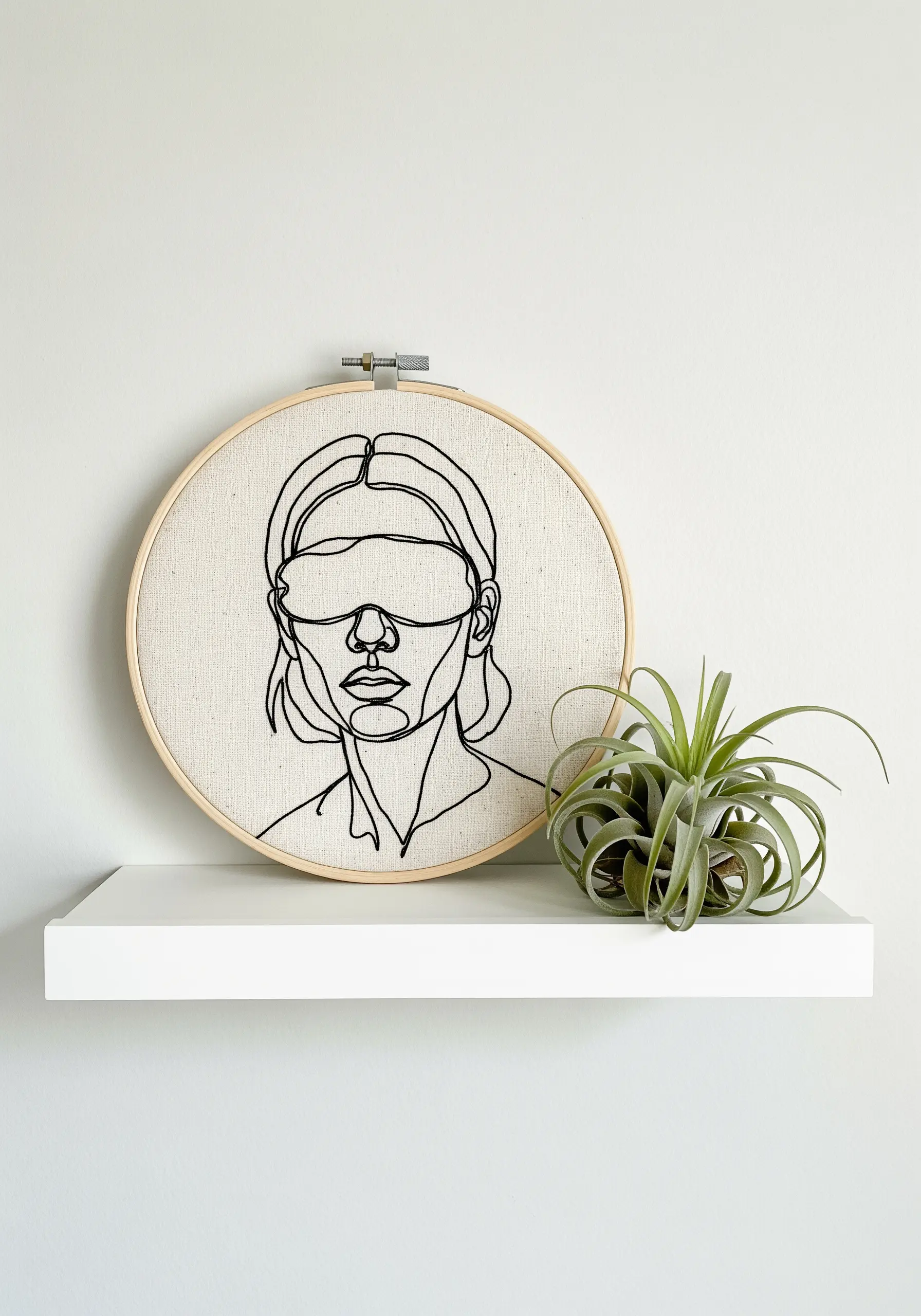 Single-line portrait of a person wearing a blindfold created with negative space.