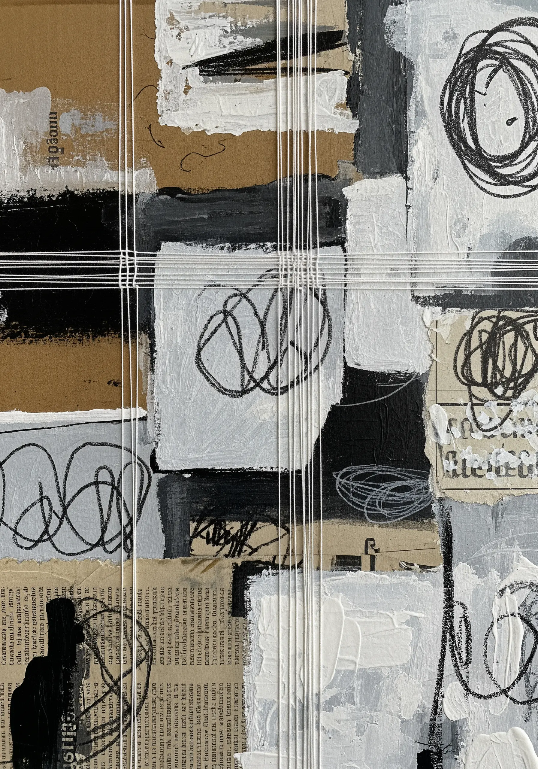Abstract monochrome collage with long, taut white threads stretched across the composition.