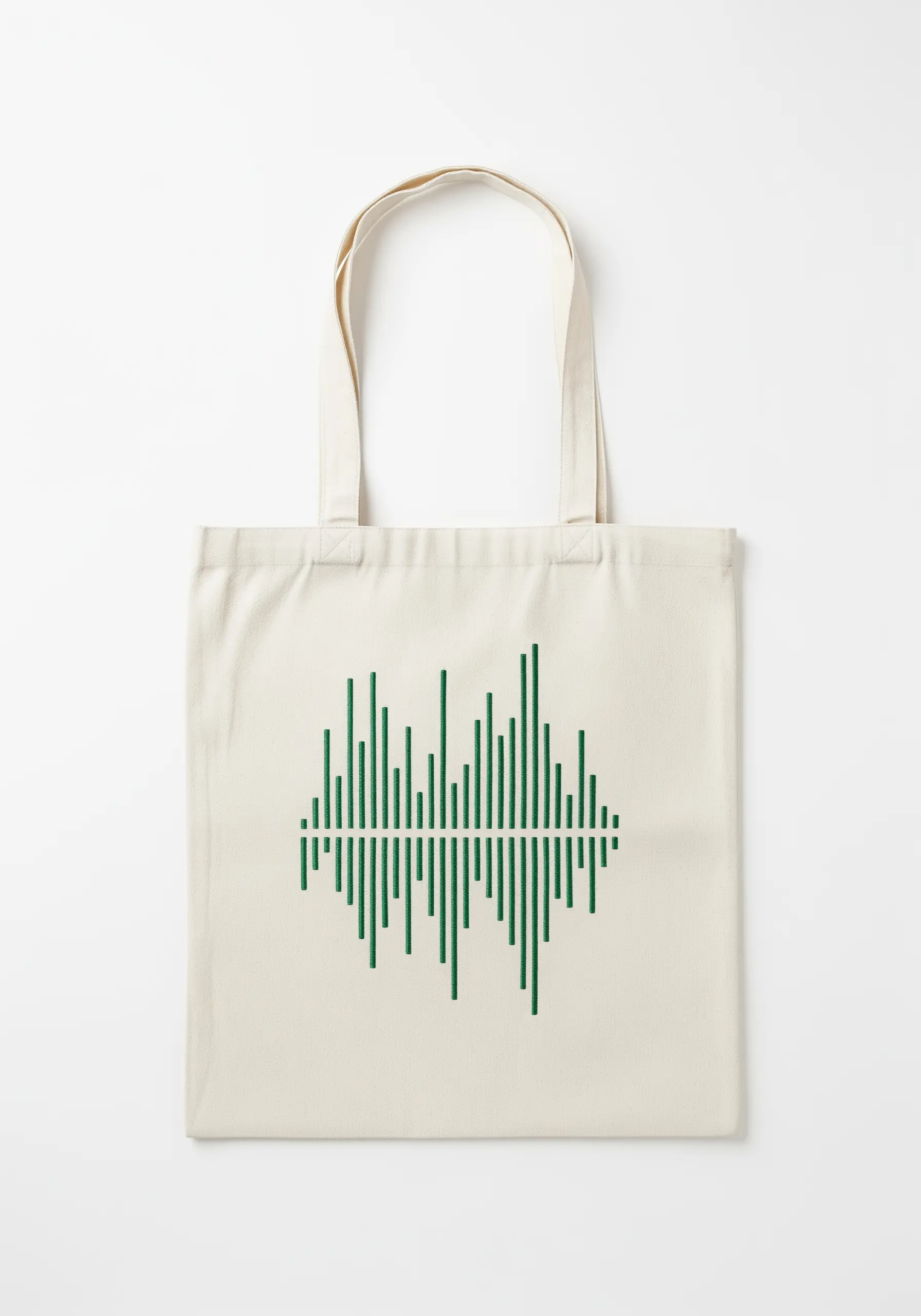 A green embroidered soundwave pattern made of vertical satin stitches on a canvas tote.