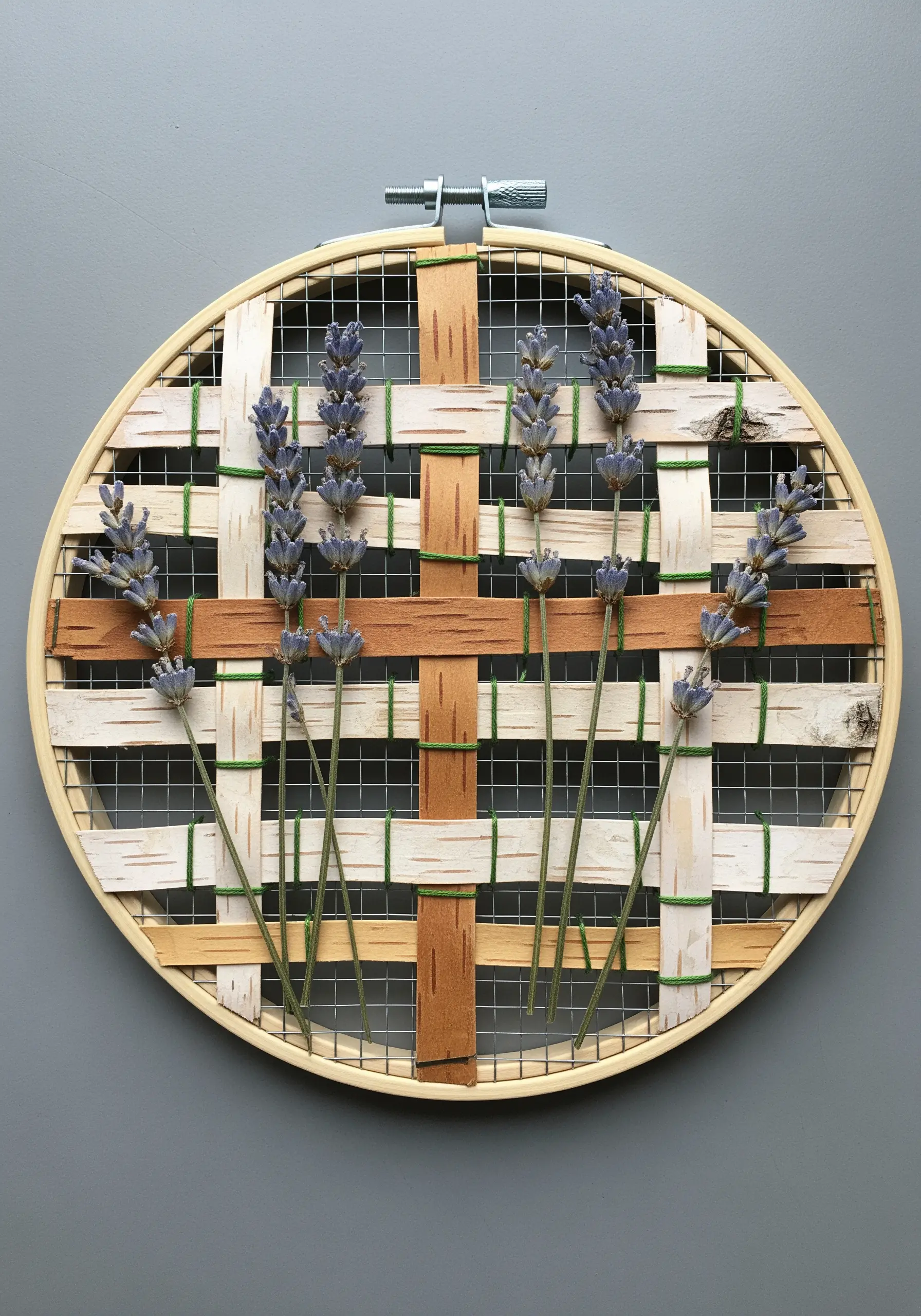 Embroidery hoop with woven birch bark strips and dried lavender