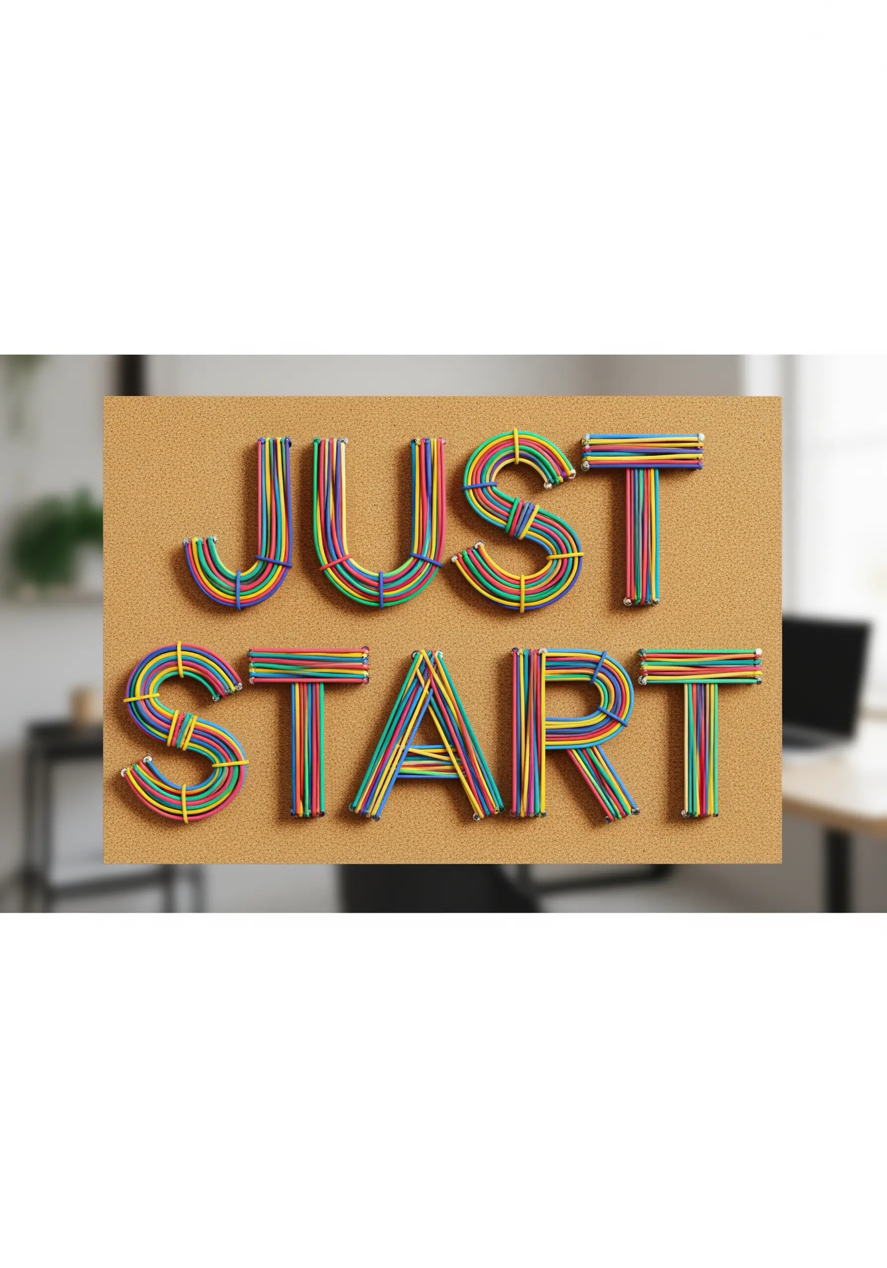Colorful wrapped cord typography spelling JUST START on cork