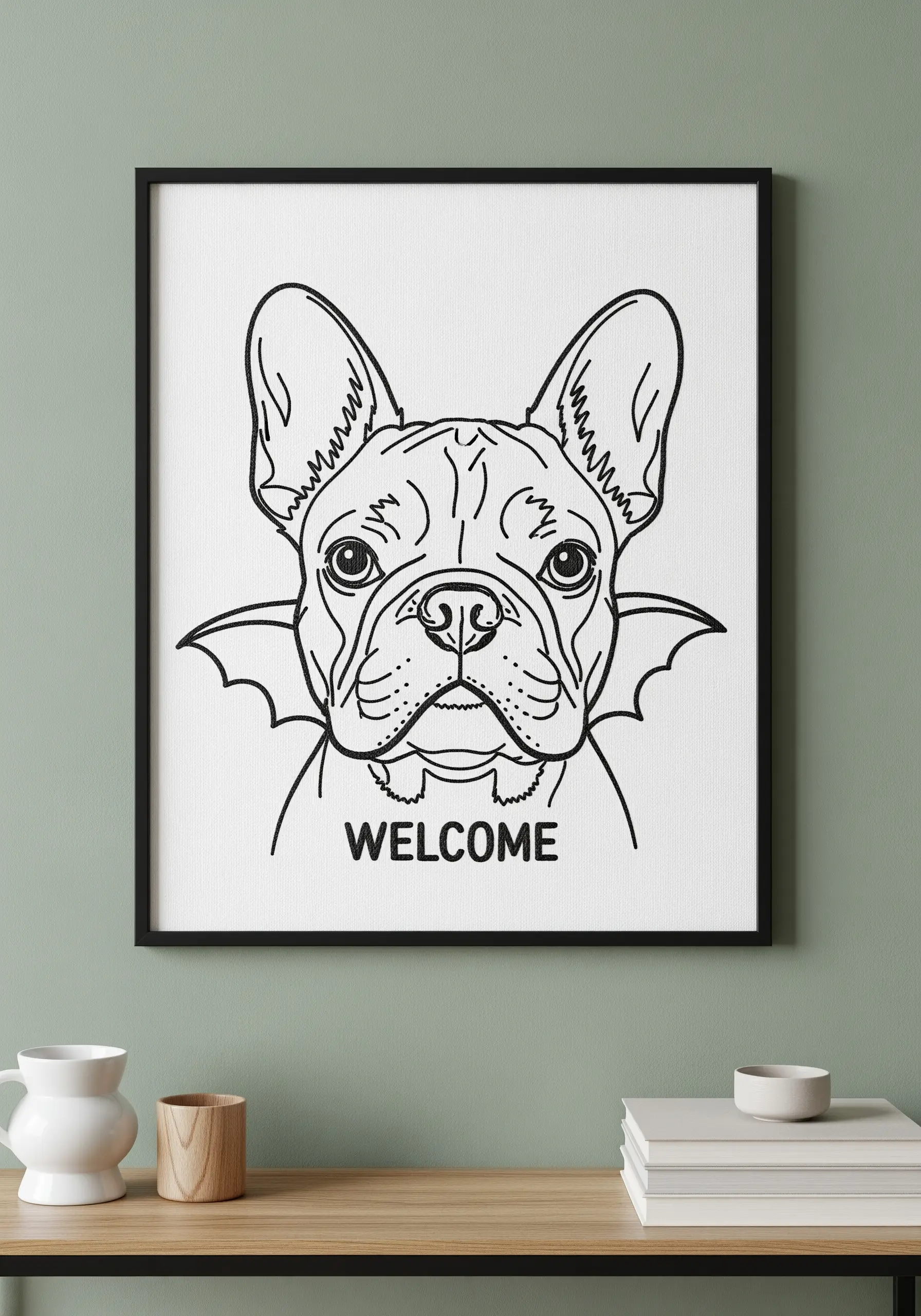 Line art of a French bulldog in a black frame with the word 'Welcome' stitched below.
